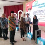 Yenny Elita Bersama Pj.Bupati OKU Beri Bantuan Mesin Jahit Kepada Pelaku UMKM