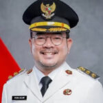 Realisasikan 70% Janji Kampanye, Pemkot Palembang Bagi Seragam dan Kain Kafan