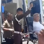 Datang Pakai Ambulan Haji Alim Penuhi Panggilan Kejati Sumsel